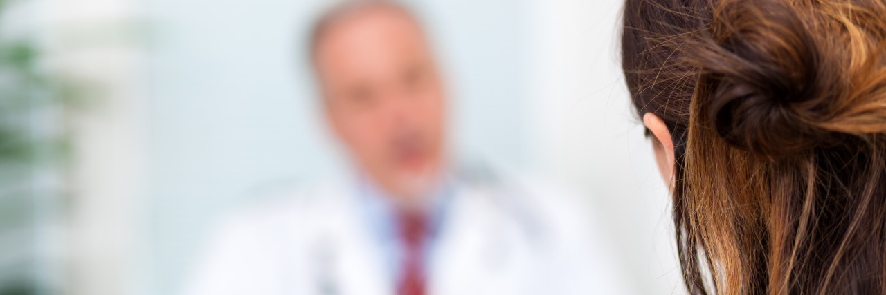 When an Immunology Consultant Accused Me of Wasting His Time female patient talking to male doctor consultant