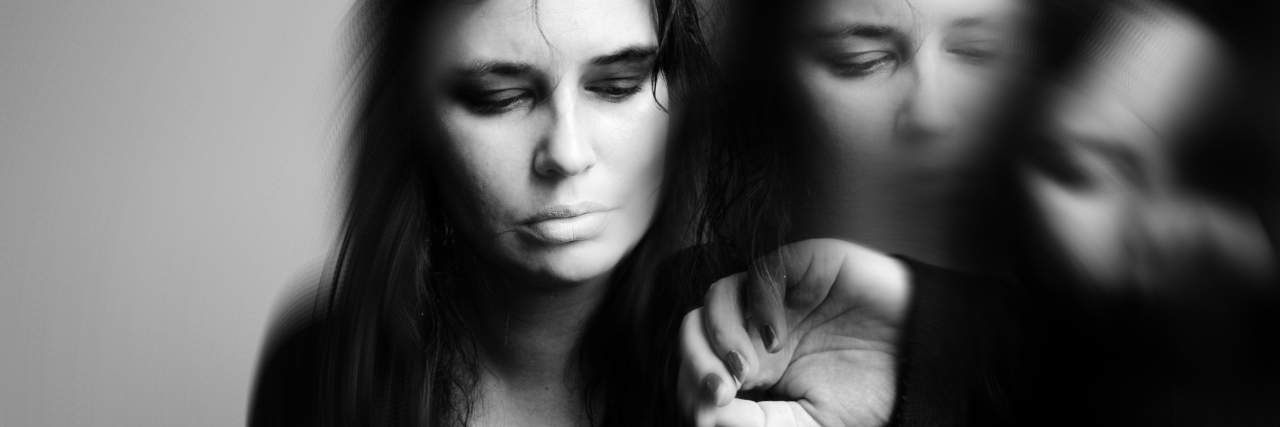 What My Good and Bad Days Look Like With Fibromyalgia A double exposure photo of a woman.