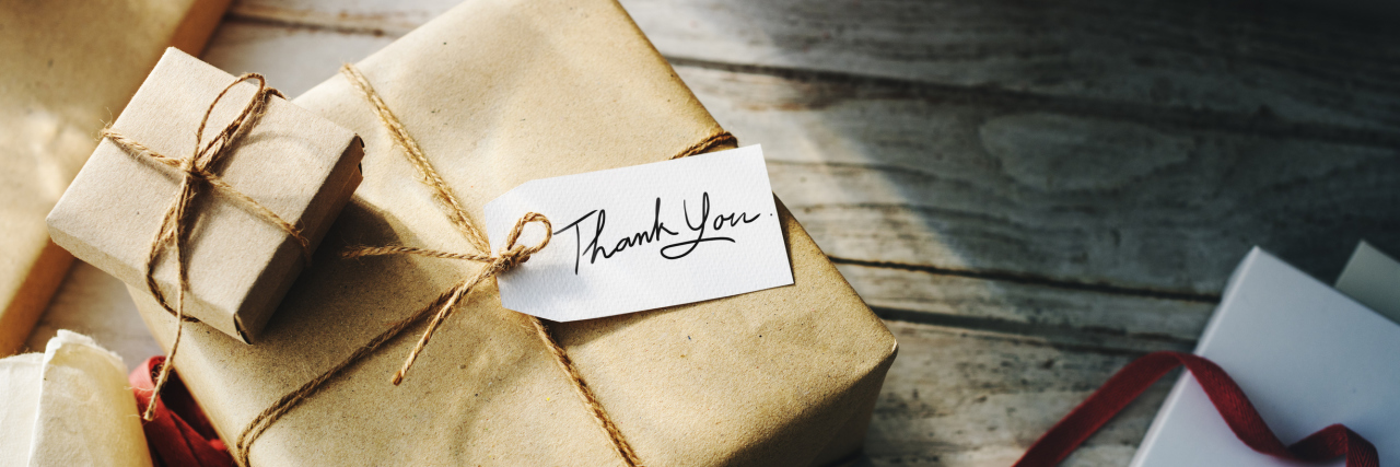 Tips for a Better Relationship With the Special Education Team Gift wrapped in brown paper, tag says: thank you