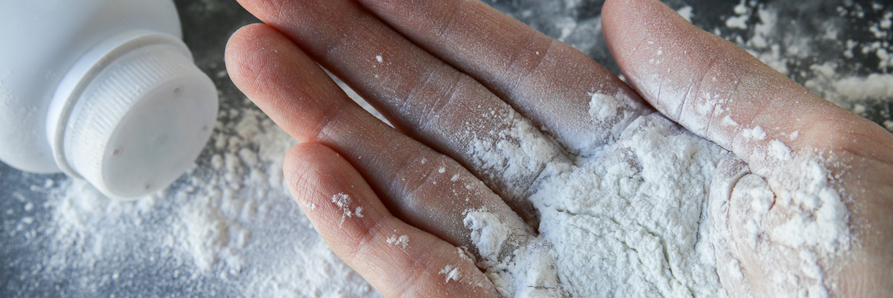 Court Orders Johnson & Johnson Pay Woman Who Developed Ovarian Cancer $417 Million Talcum powder on hands