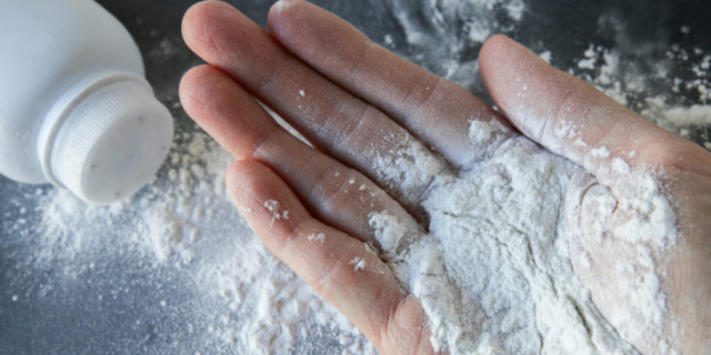 Talcum powder on hands