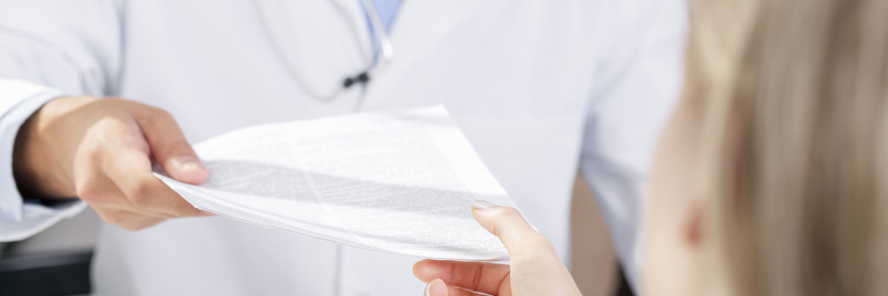 To the Doctor Who Handed Me a Weight Loss Pamphlet doctor give a document to patient