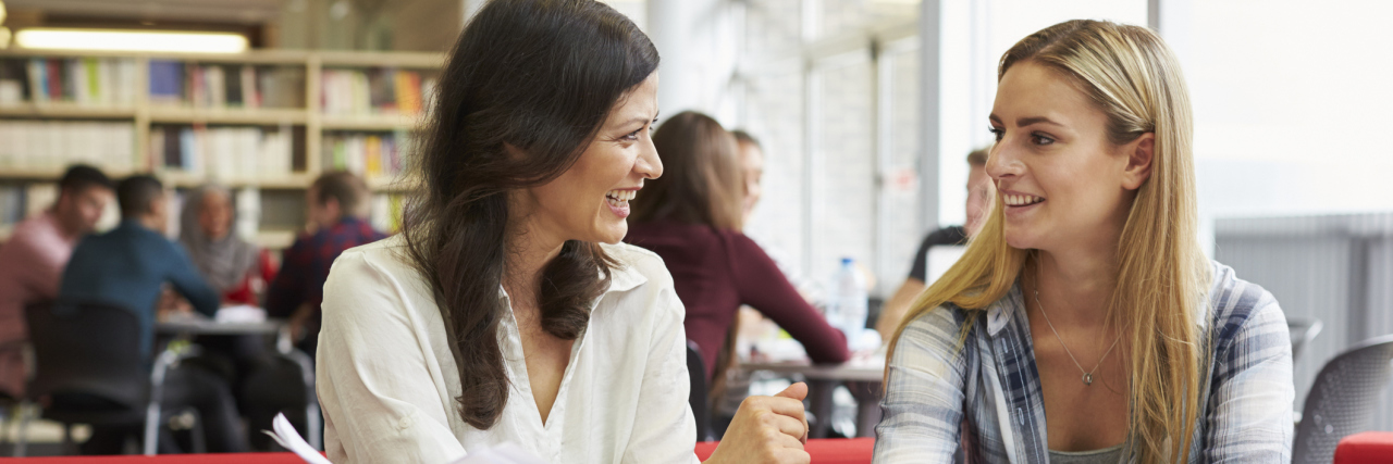 ME/CFS: How Teachers Can Help Chronically Ill Students in School student talking with her teacher