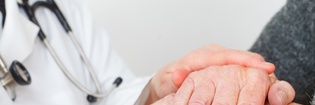 Feeling Grateful for the Doctors Who Treat Me as a Person doctor comforting patient's hand