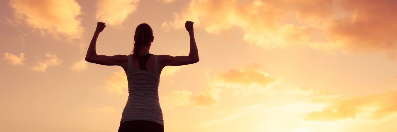 Cancer Can't Stop My Body From Doing Some Pretty Amazing Things woman showing strength in sunset