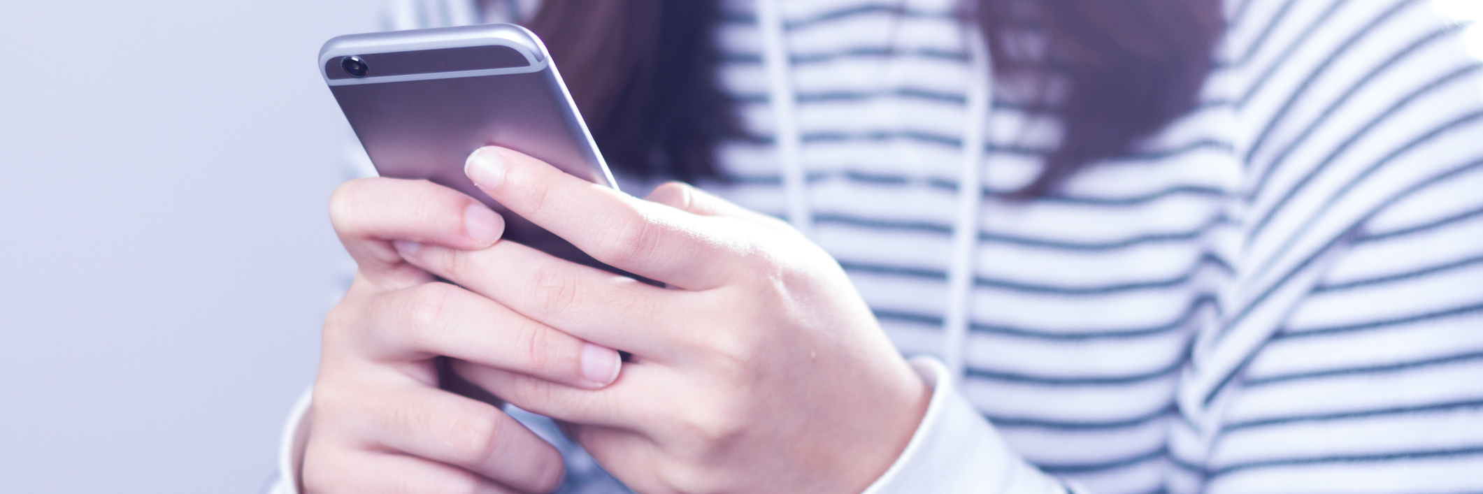 Why I Left Some of the Fibromyalgia Support Groups Woman using smart phone.