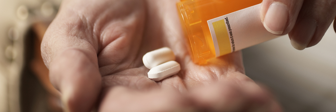 Asthma, Type 2 Diabetes: Positives and Negatives of Taking Prednisone woman pouring pills into her hand from bottle