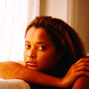 A young woman sitting on a couch