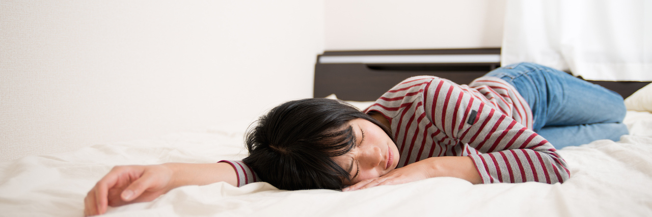 woman laying in bed