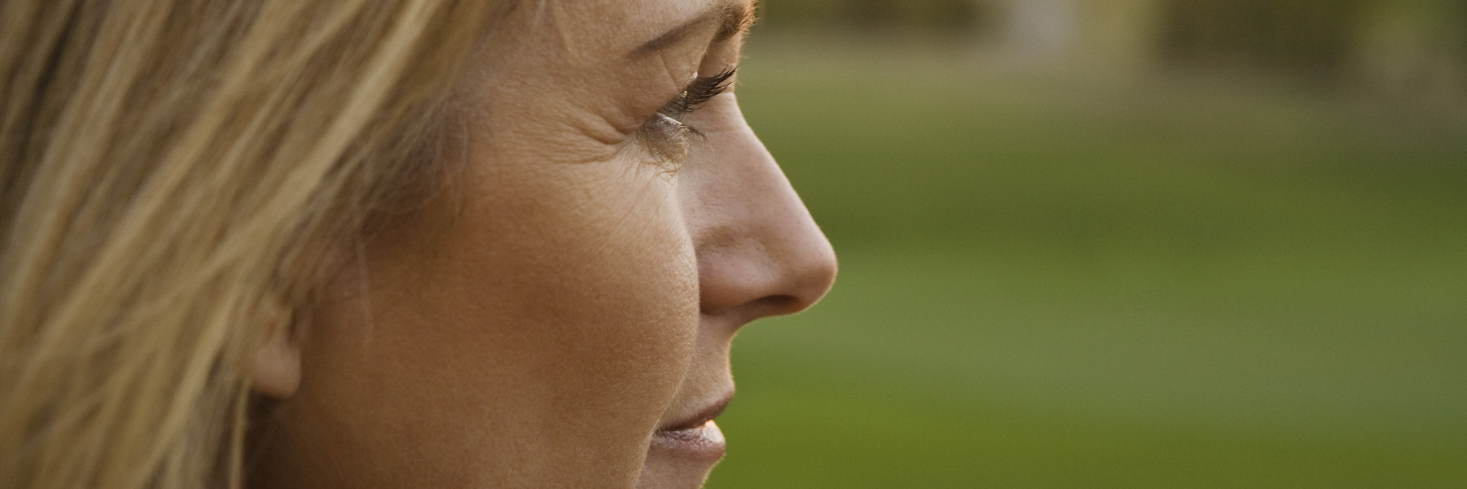 Being Honest and Realistic When Talking About Chronic Illnesses profile of a woman at sunset