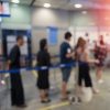 Blurred background queue at airport