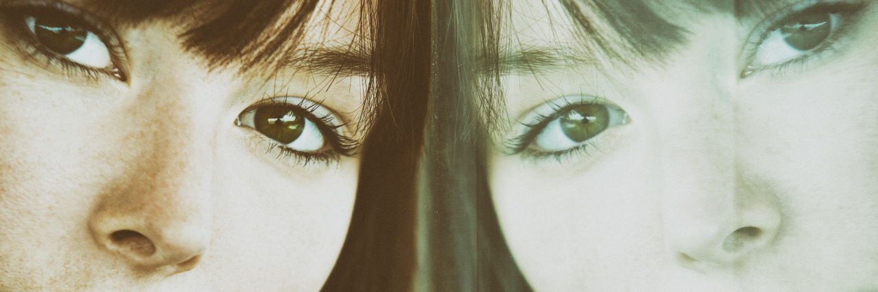 Autism and the Freedom to Be Yourself Young woman and reflection.
