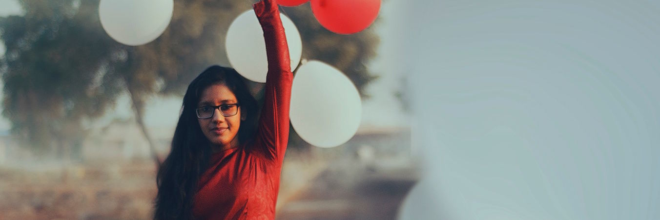 What Generalized Anxiety Disorder Is (and What It Isn't) woman with balloons