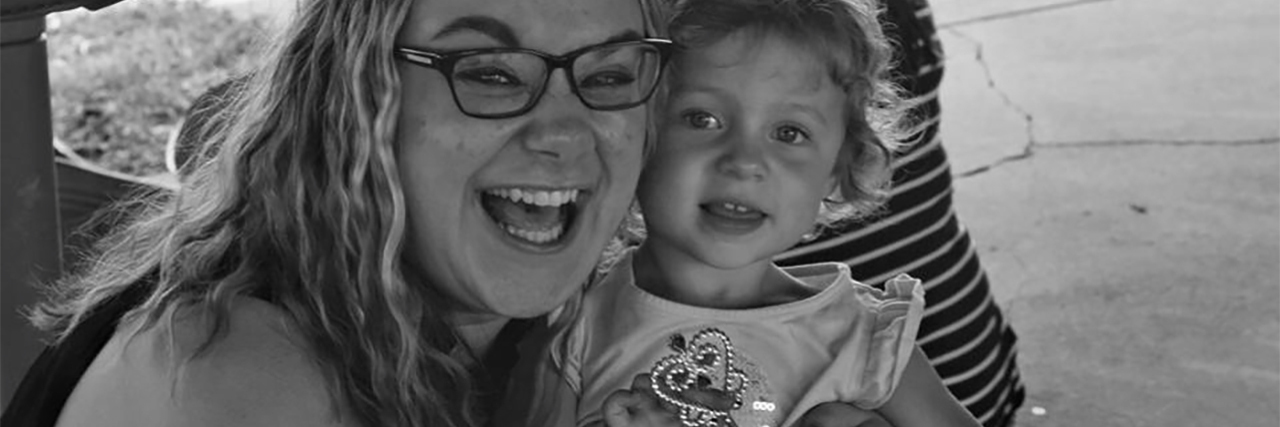 How My Anxiety Affects Working With Children black and white photo of smiling woman next to young child