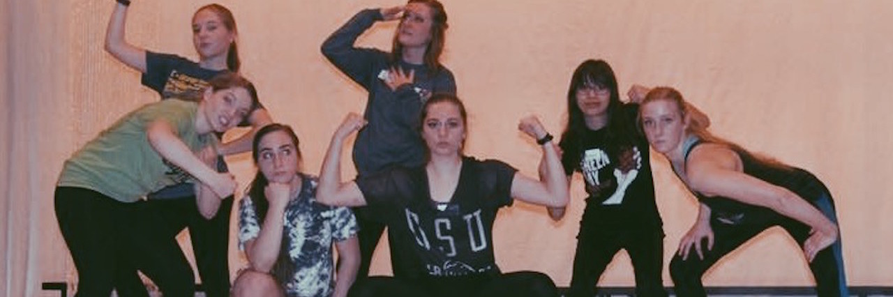group of young women posing wearing leggings