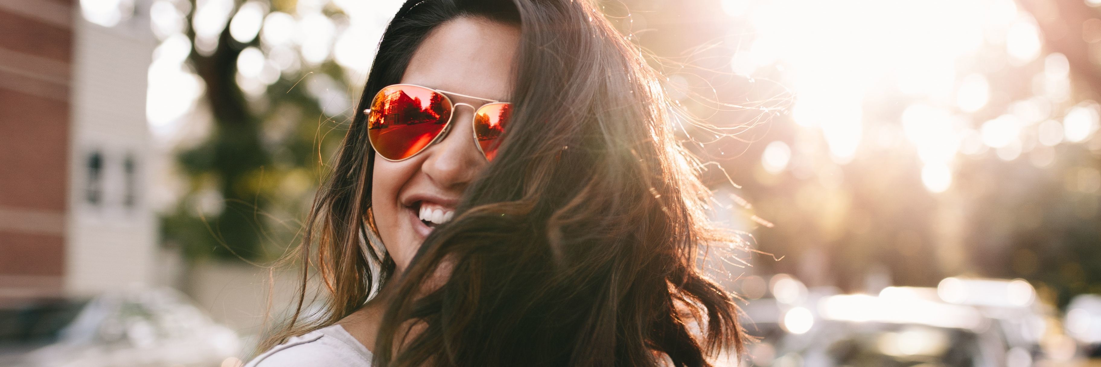 What You Don't See About 'Happy' People With Depression woman smiling