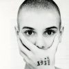 sinead oconnor covering her mouth with her hands