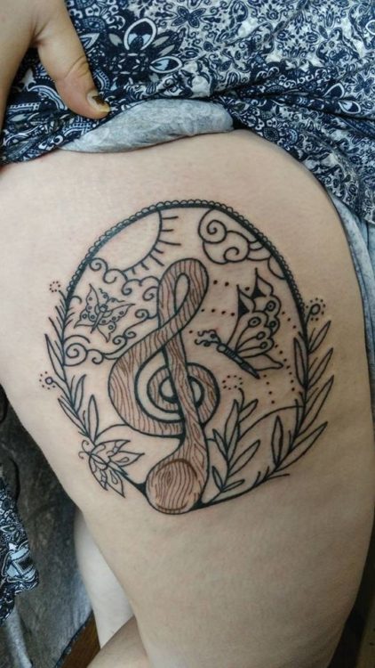 tattoo with music note and butterfly