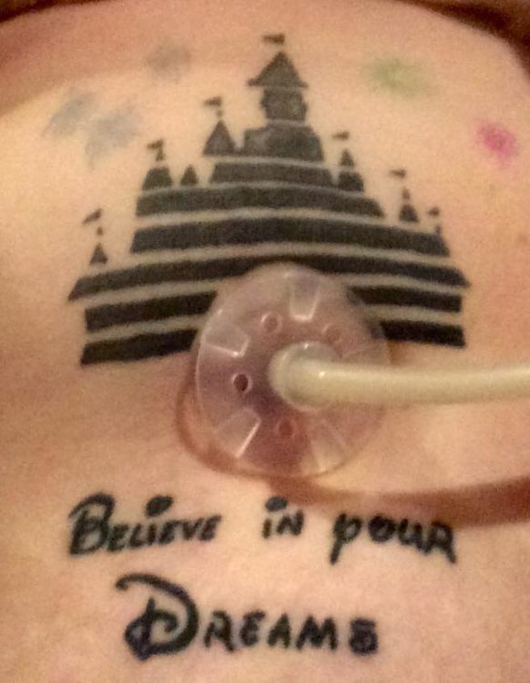 tattoo that says 'believe in your dreams' with a disney castle