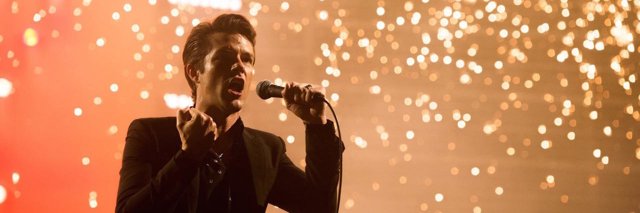 The Killers' New Album Is Inspired by Complex PTSD Brandon Flowers performing