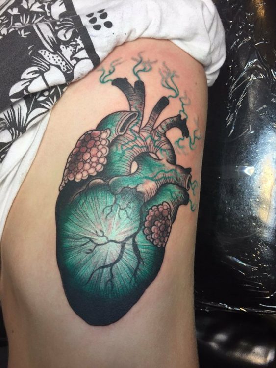tattoo of an anatomical green heart