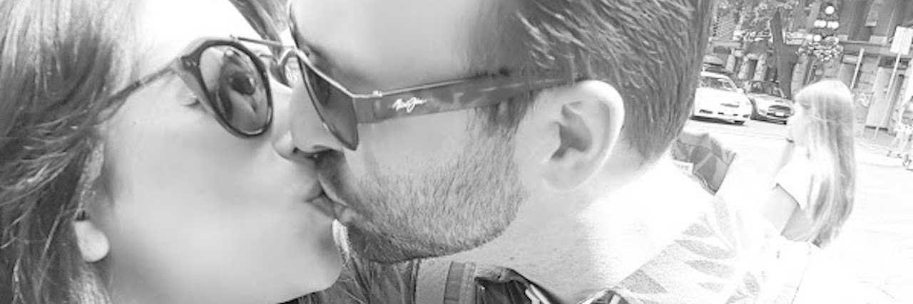 Remaining Hopeful Through Daily Chronic Pain of Ehlers-Danlos Syndrome black and white photo of man and woman kissing