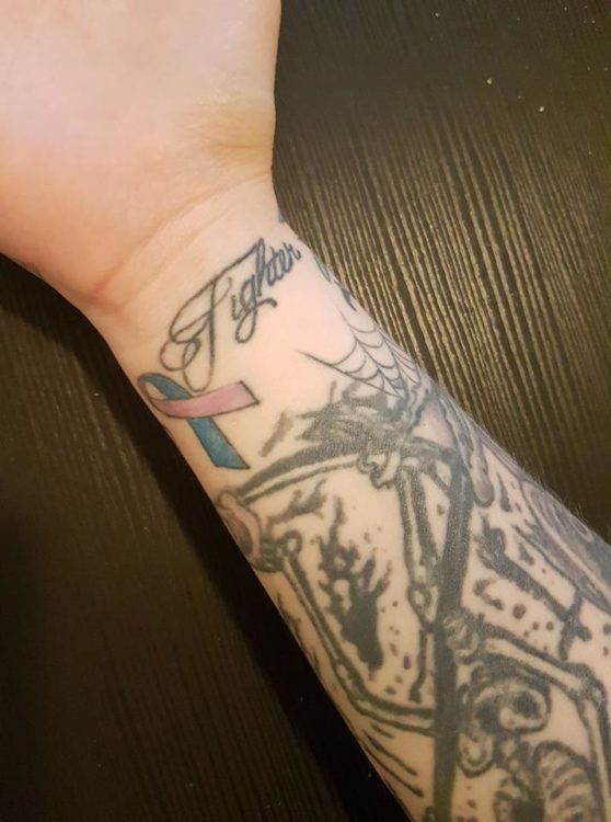 tattoo that says 'fighter'