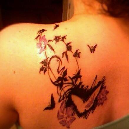 tattoo of a purple butterfly