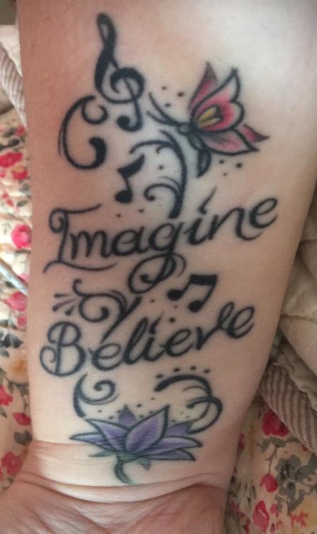 tattoo that says 'imagine' and 'believe'