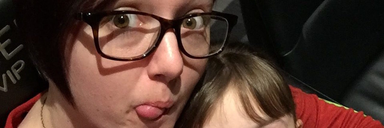 This Photo of a Mom With Her Kids Doesn't Reveal Her Chronic Illness mother at the movie theater with two kids