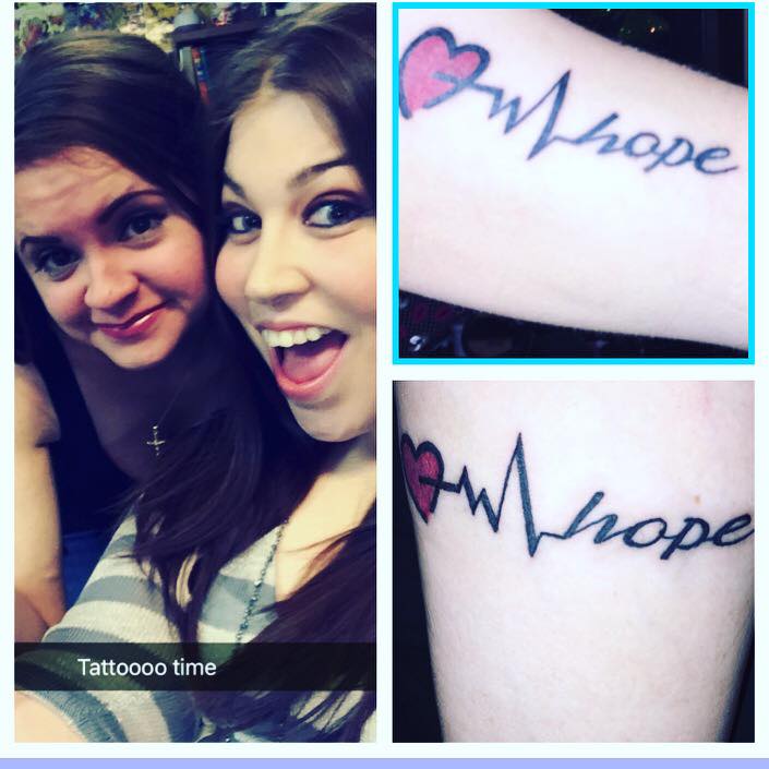 two women with matching 'hope' tattoos