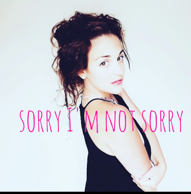 photo of kimberli with the text 'sorry I'm not sorry'