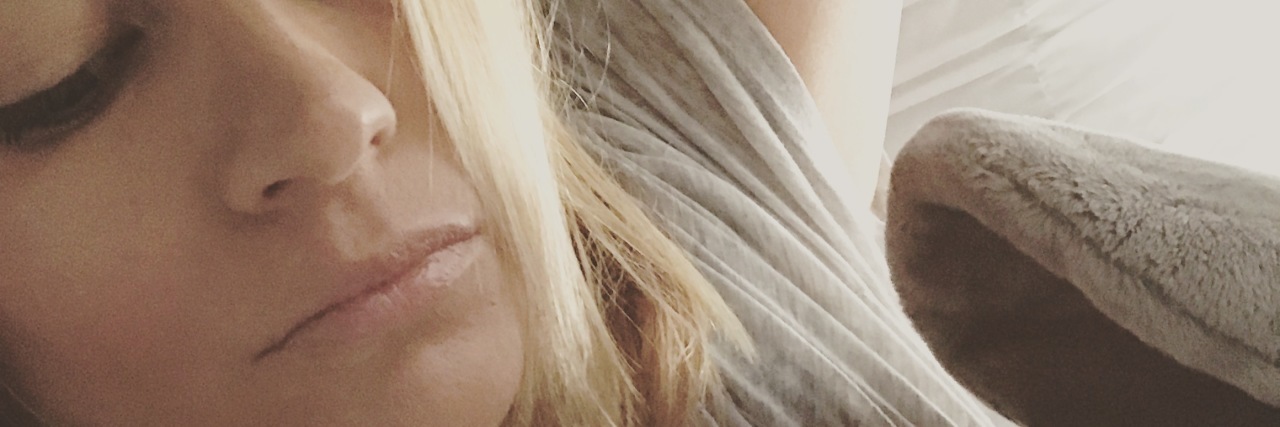 When Depression Makes It Hard to Get Out of Bed blonde woman tired lying in bed