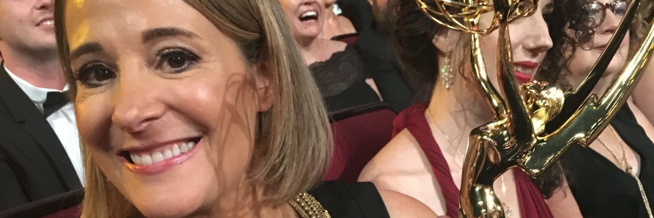 'Born This Way' Continues to Break Glass Ceiling Casting Director Sasha Alpert holding her Emmy