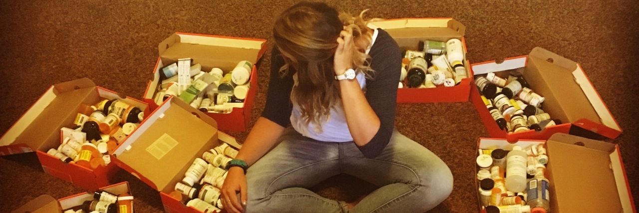 Why Sharing About My Experience With Lyme Disease Has Been Good for Me Sadie Williams poses with her Nike shoe boxes full of empty prescription and supplement bottles she has collected over the past 3 years of her fight against Lyme.