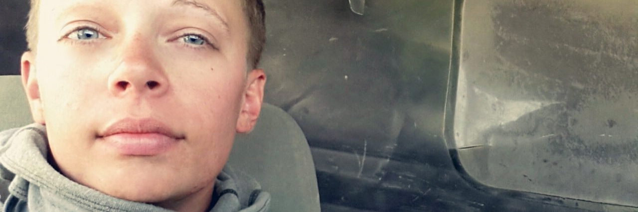 An Apology to the Friends My Anxiety Made Me Abandon young woman in US military tank with shaved head