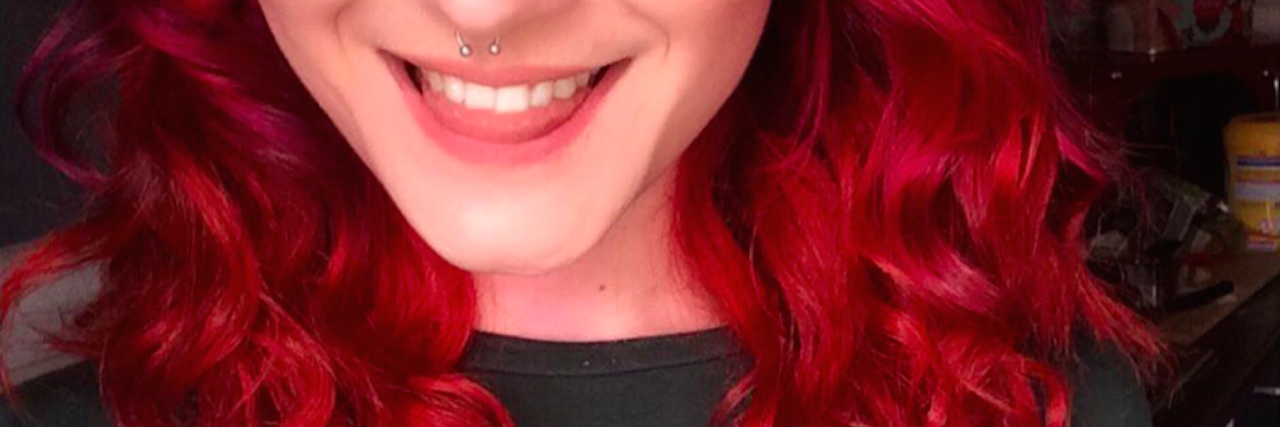 Milly Smith Posts Photo of Herself Hours Before Suicide Attempt photo of a woman smiling. Text reads: Taken 7 hours before I attempted suicide