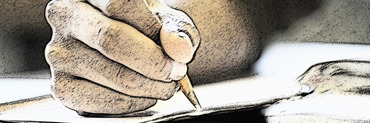 Finding Your Identity as a Disabled College Student Young woman's hand writing with a pencil.