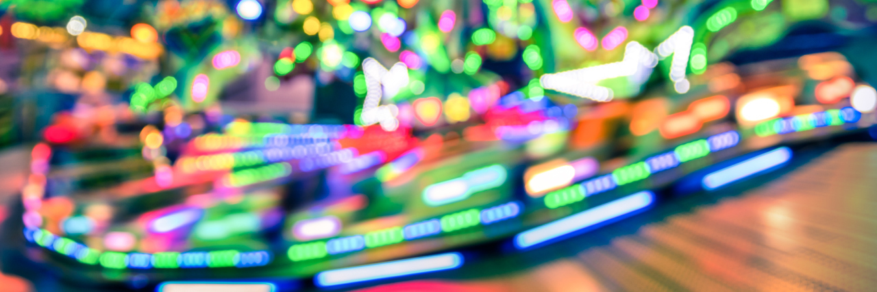 blurred photo of a carnival ride