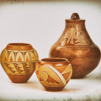 Three Native American Pueblo pottery vases.
