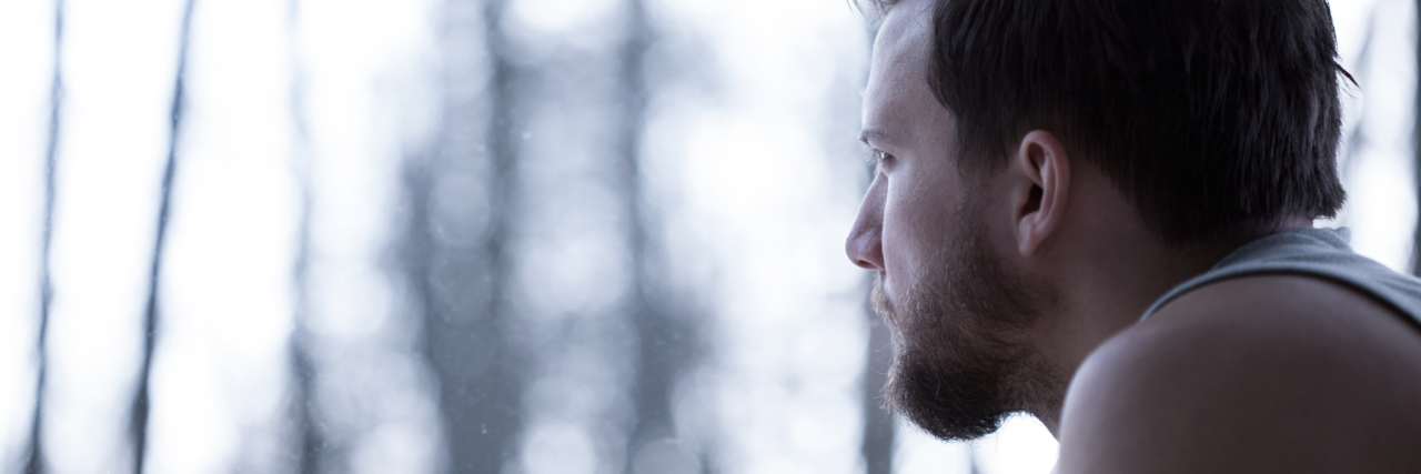 Fearing for the Future With Vascular Ehlers-Danlos Syndrome (vEDS) man looking out the window on a foggy day