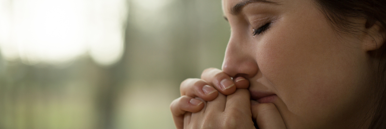 Pulmonary Hypertension, Endometriosis: Being Unable to Have Children woman with her eyes closed standing next to a window