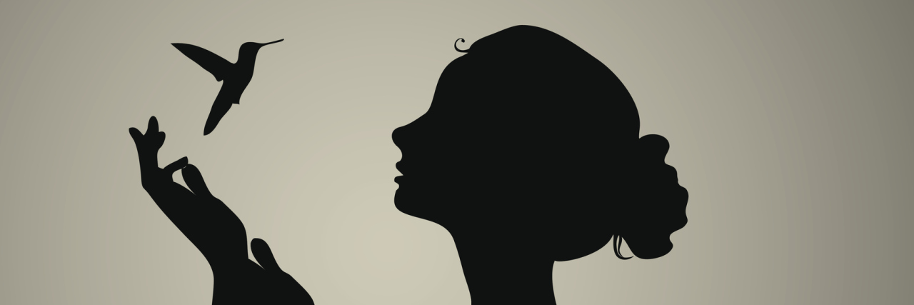 The Importance of Kindness and Support When You're Chronically Ill Black silhouette of a woman with a hummingbird.