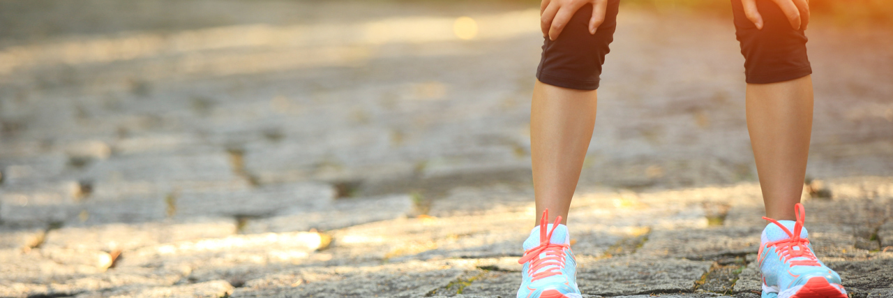 How I Cope After Complex Regional Pain Syndrome Ended Athletic Career tired female runner taking a rest after running hard in countryside road
