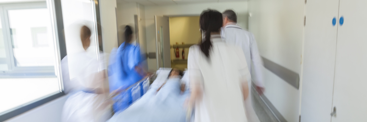 Asthma: Going to the Emergency Room With an Acute vs. Chronic Illness patient on a stretcher in the emergency room