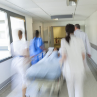 patient on a stretcher in the emergency room