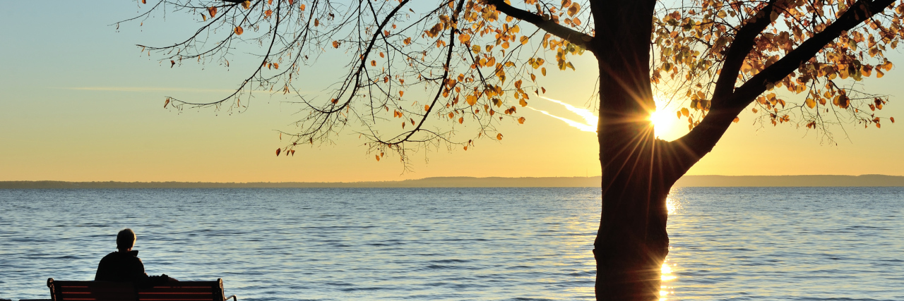 5 Years Ago, a Testicular Cancer Diagnosis Changed My Life Forever Man Watching the Sunrise over Lake in the Late Fall