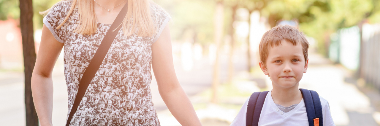 I’m Not The 'Stuck Up' Mom — I Have Social Anxiety 7 years old boy going to school with his mother