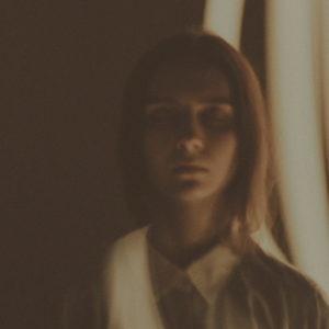 A photo of a woman with a light affect.