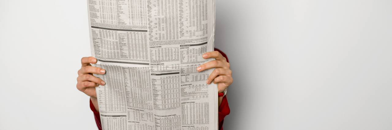 How Journalists Should Write and Report About Bipolar Disorder Woman reading newspaper